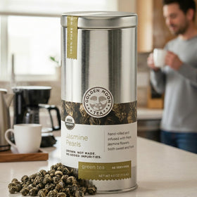 Brewed Jasmine Dragon Pearl cup by Golden Moon Tea showcasing mellow flavor.