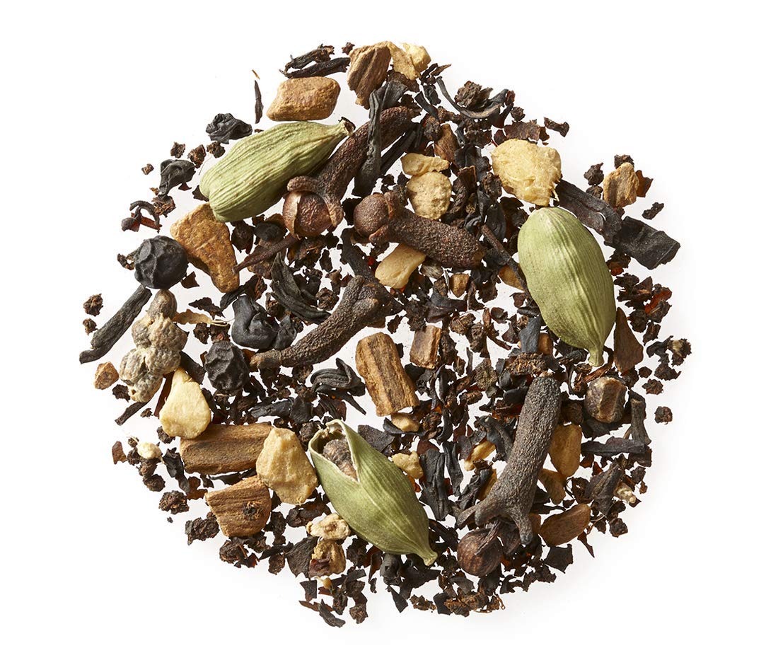 Golden Moon Tea Masala Chai blend with cardamom, cinnamon, and cloves for a fragrant cup.