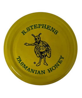 Tasmanian wilderness landscape behind Golden Nectar Leatherwood Honey emphasizing provenance
