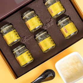 Golden Nest original recipe bottle with aroma and gentle texture suggesting a home-cooked feel.