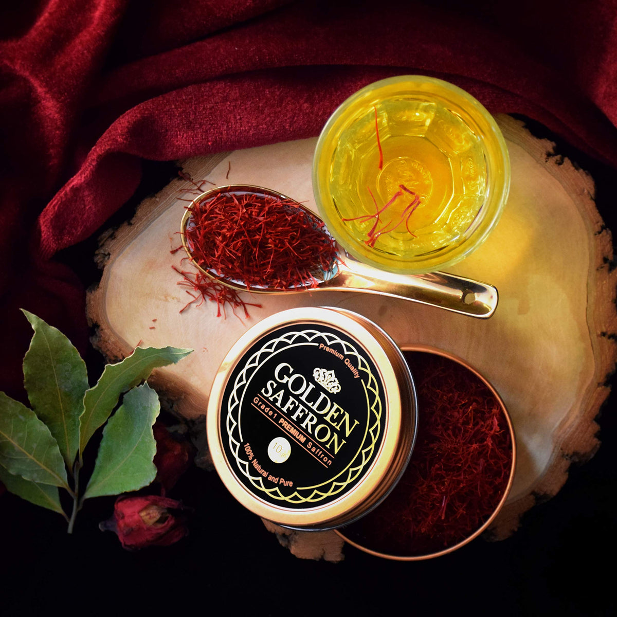 Golden Saffron threads on a spoon releasing aroma and delicate flavor notes.