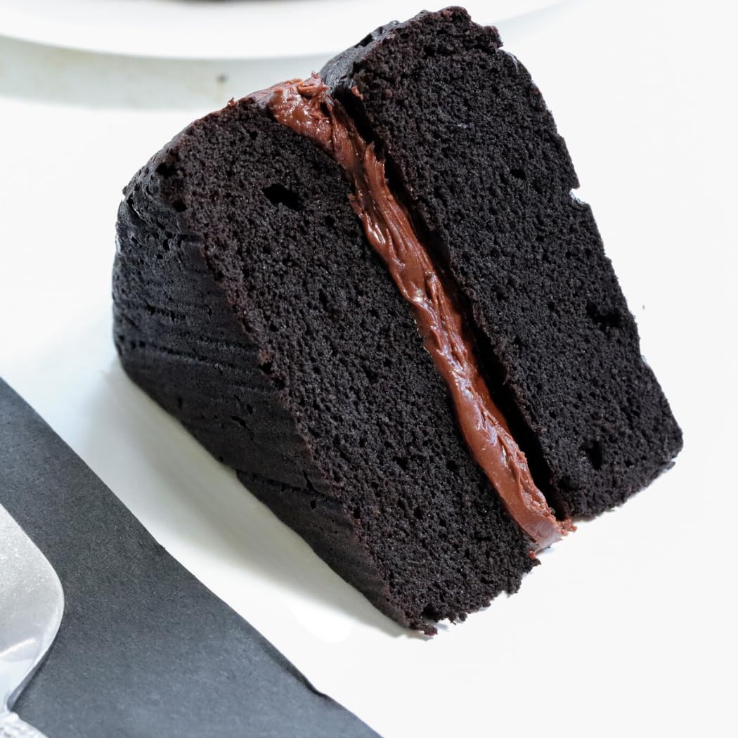 A Good Dee's Devil's Food Cake slice on plate, highlighting 2g net carbs per serving.