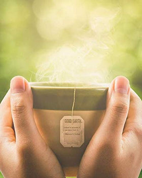 Steeping Good Earth Sweet & Spicy Matcha produces a vibrant green brew.