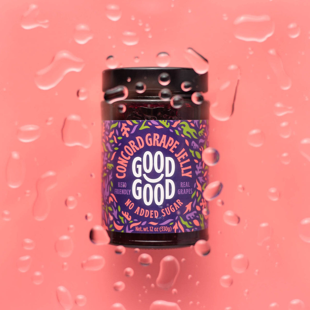 Good Good Healthy Jam Variety Pack Concord jar on pantry shelf, rich flavor with fewer calories.
