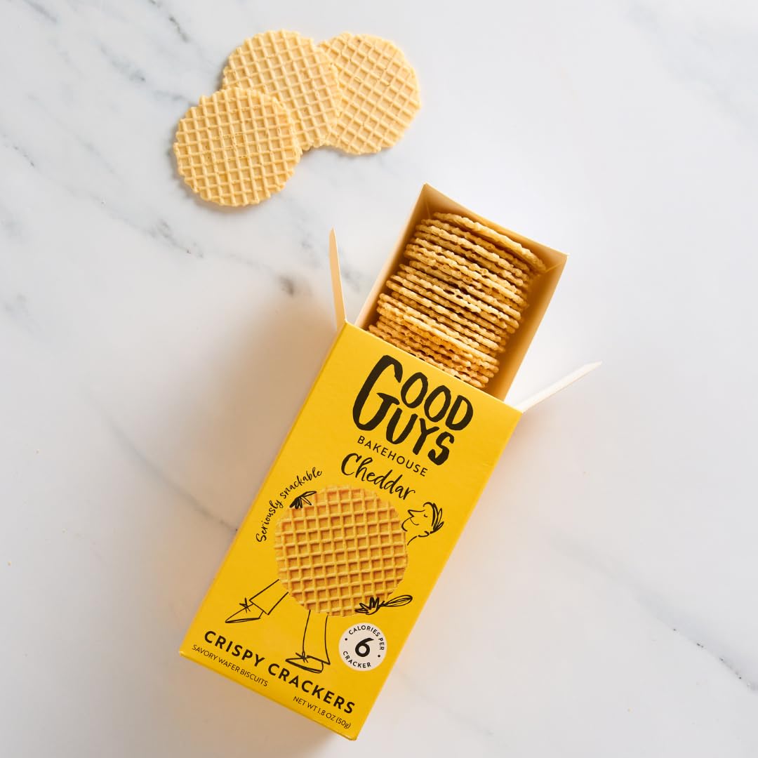 Good Guys Bakehouse Cheddar Crackers bite shot capturing crunchy texture and cheesy flavor