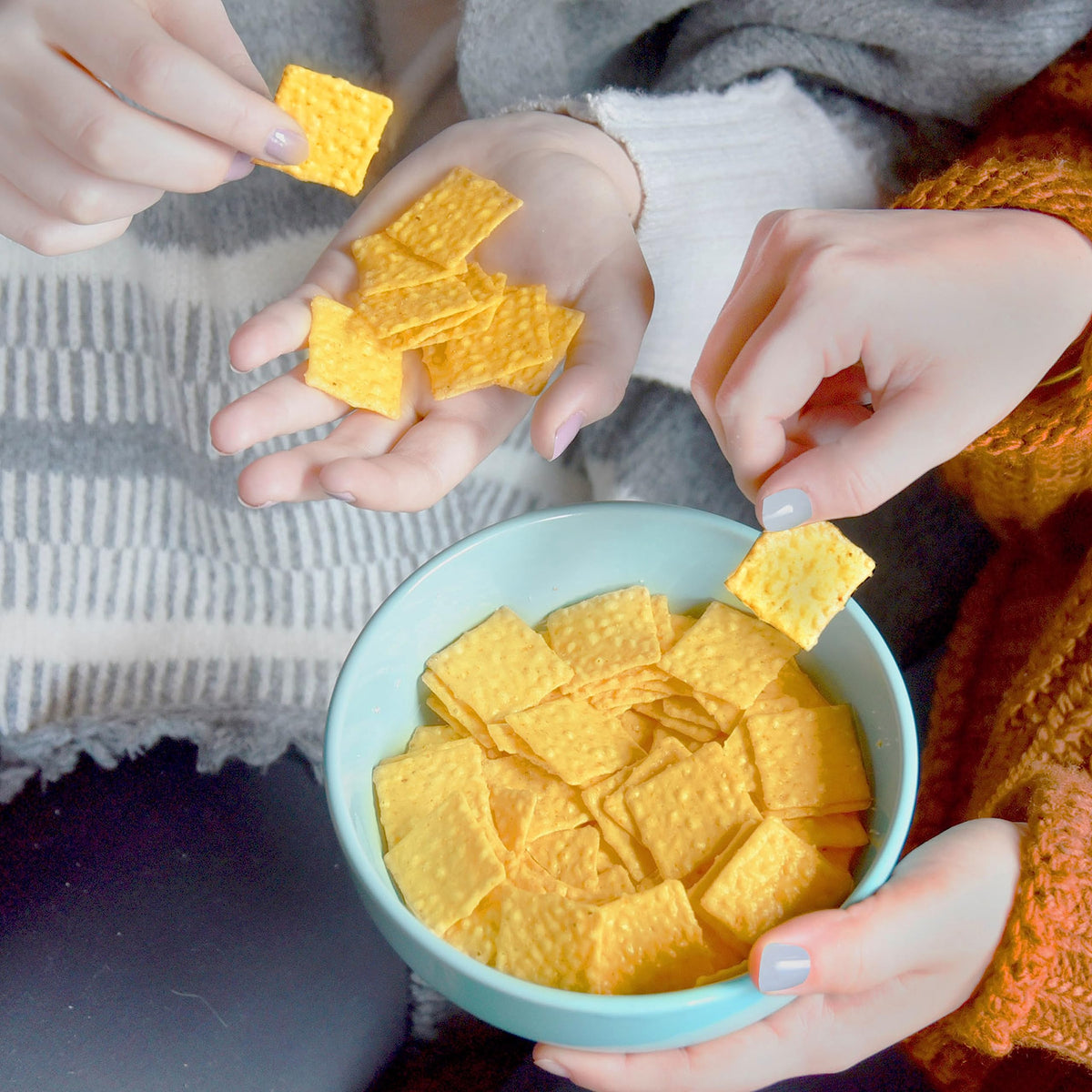Good Thins crispy texture shot conveys a satisfying bite.