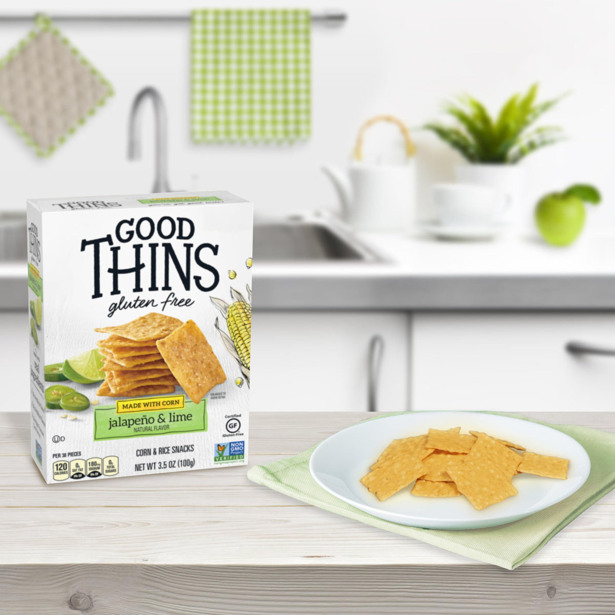 Good Thins family snack-time scene highlights shareable crunch for adults and kids.