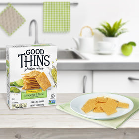 Good Thins family snack-time scene highlights shareable crunch for adults and kids.
