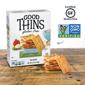 Good Thins crackers paired with cheese or dips for party snacks.