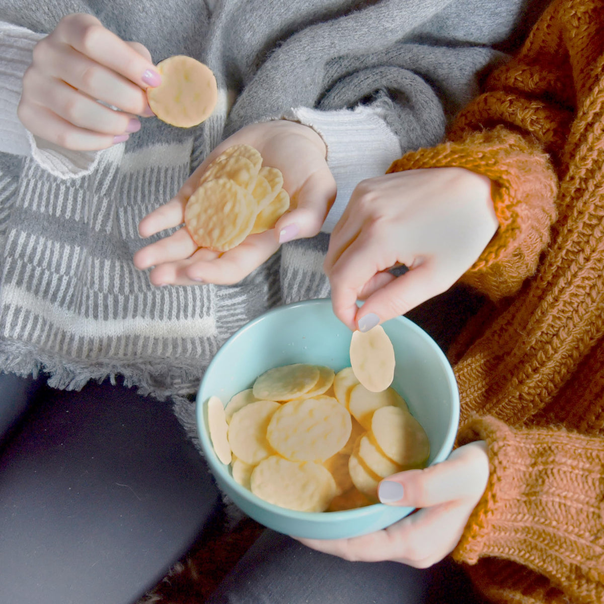 Good Thins crackers with colorfully arranged dips for party grazing.