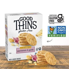 GOOD THINS round thin crackers arranged on a platter for sharing.