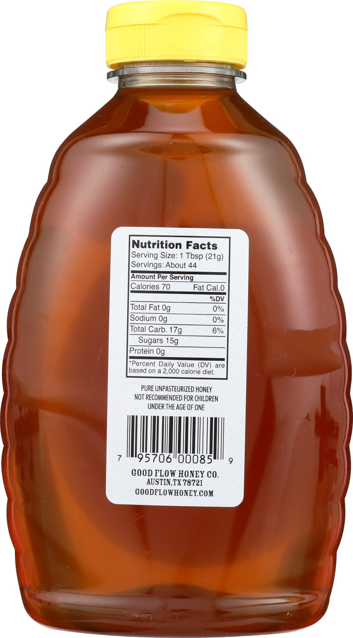 Goodflow Wildflower Honey bottle closeup showing smooth pour, ideal for tea.