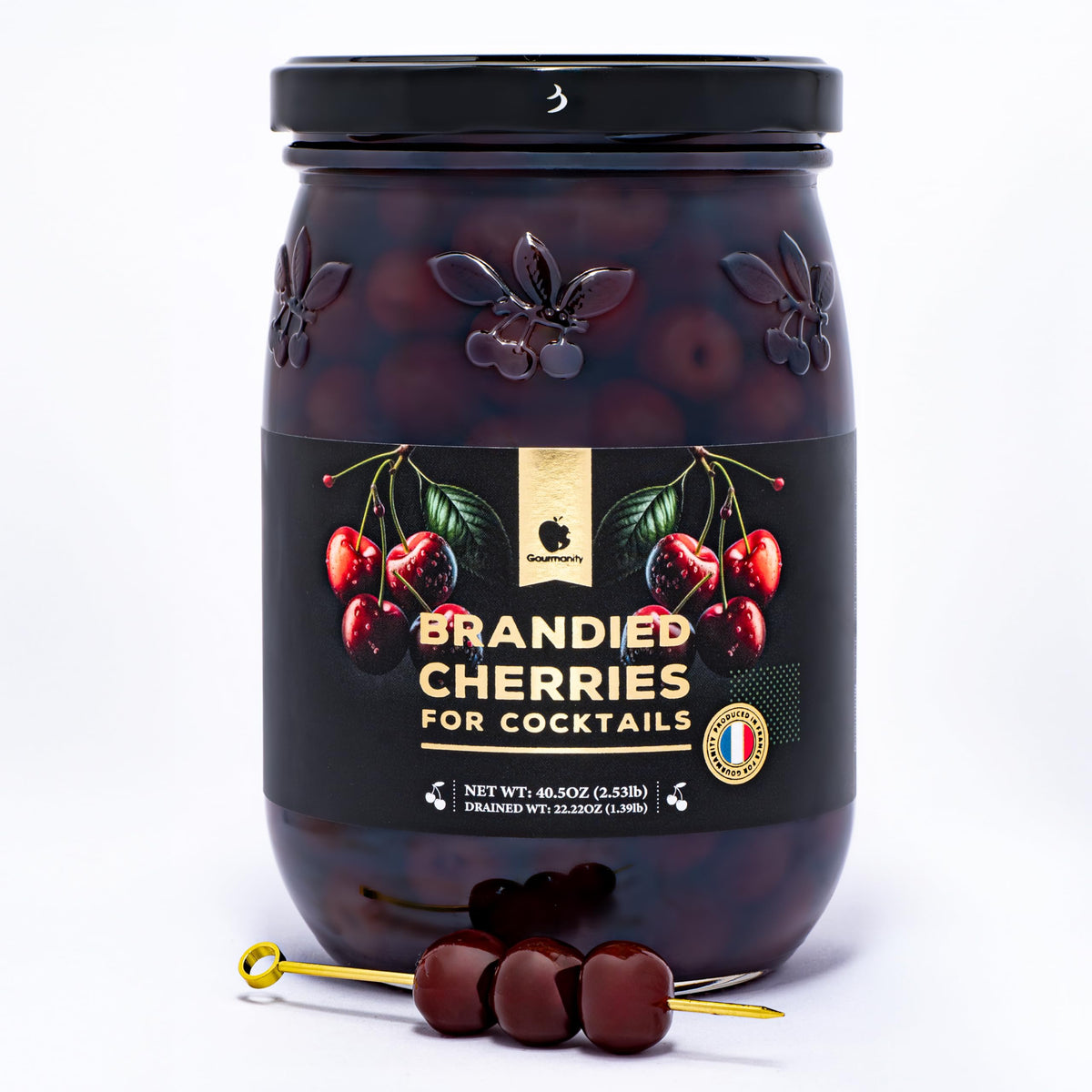 Gourmanity brandied cherries in jar front for cocktails and desserts.