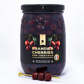 Gourmanity brandied cherries in jar front for cocktails and desserts.
