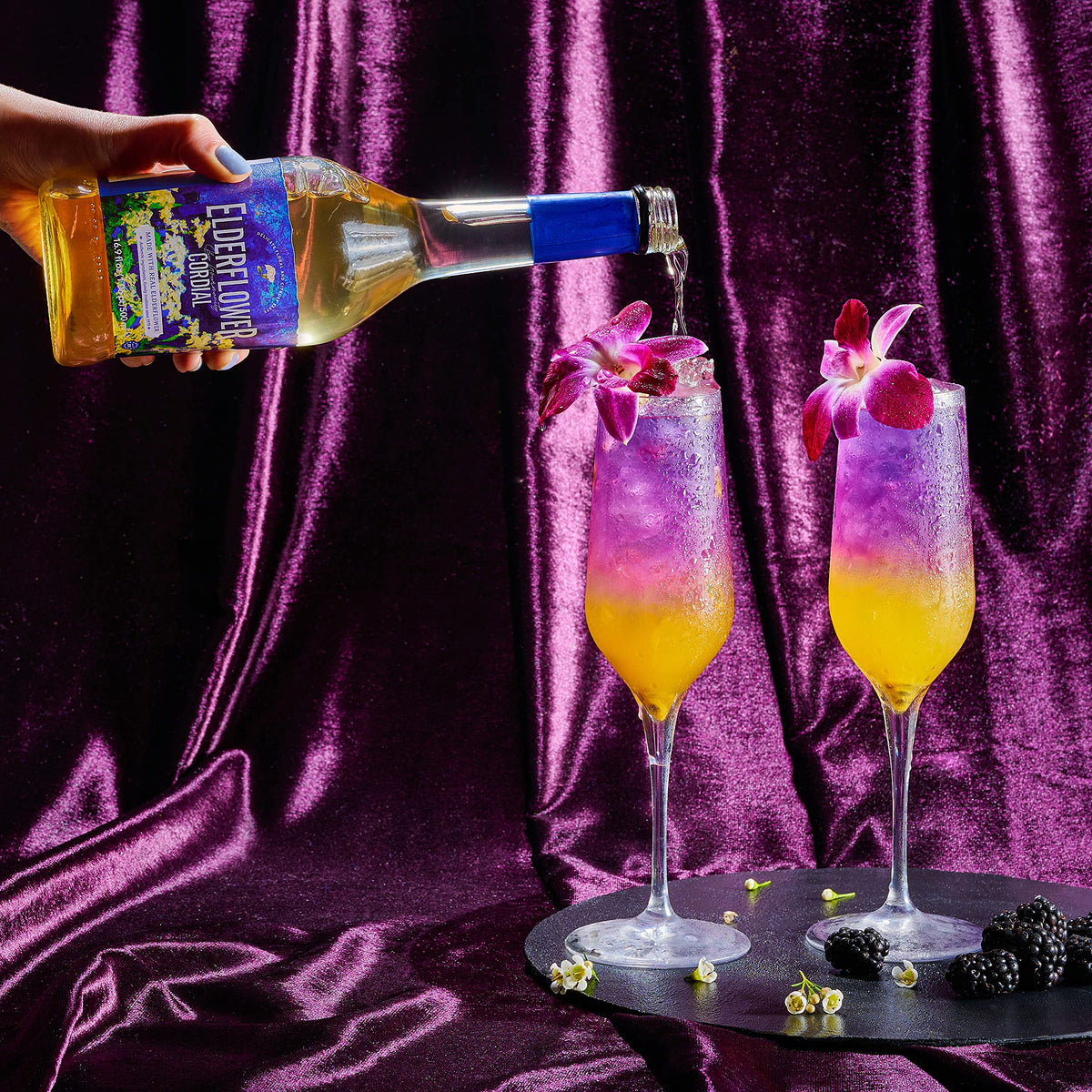 Cocktail setup featuring Gourmanity elderflower cordial
