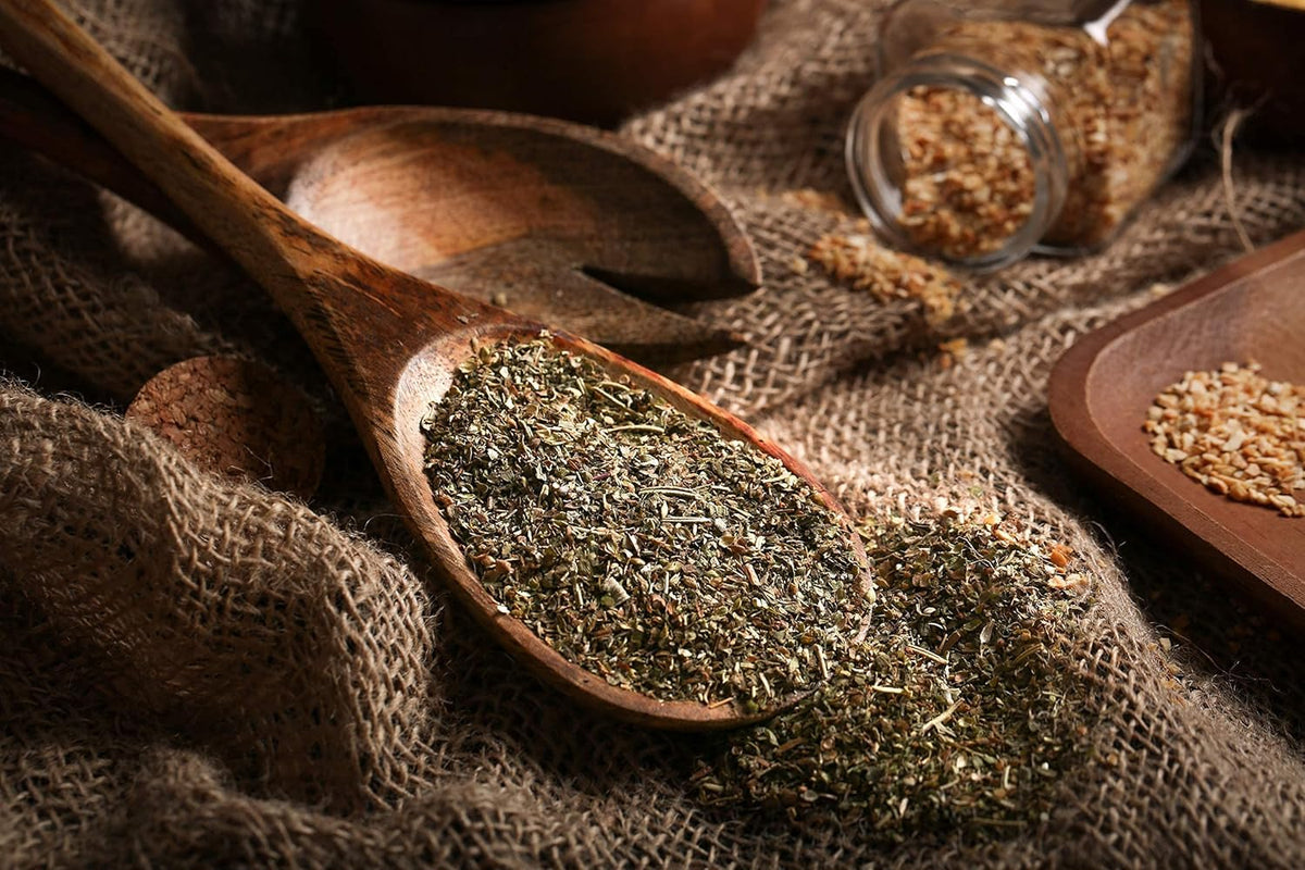 Gourmanity Italian Seasoning spice mix close-up highlights oregano and basil.