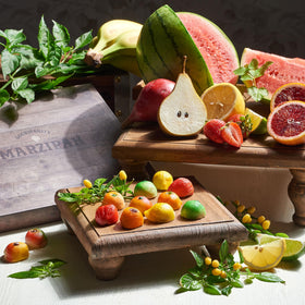 Gourmanity banana marzipan piece in vibrant color, great for party platters.