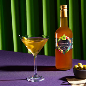 Gourmanity olive juice bottle pour enables quick dirty martinis at home.