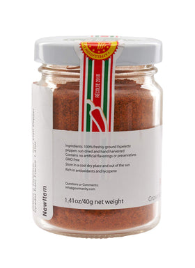 Gourmanity piment Espelette powder closeup reveals fine texture for sprinkling.