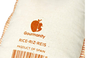Gourmanity seafood paella ingredients arranged for a coastal-inspired dinner.