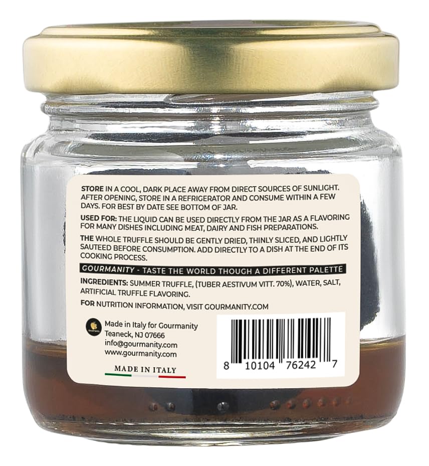 Gourmanity truffles in brine jar closeup; rich aroma enhances sauces