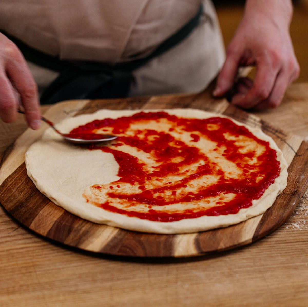 Gozney raw dough portions ready to shape for homemade pizzas.