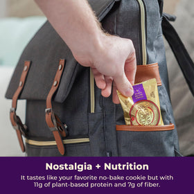 Grab The Gold on-the-go bar beside gym gear highlights convenient nutrition
