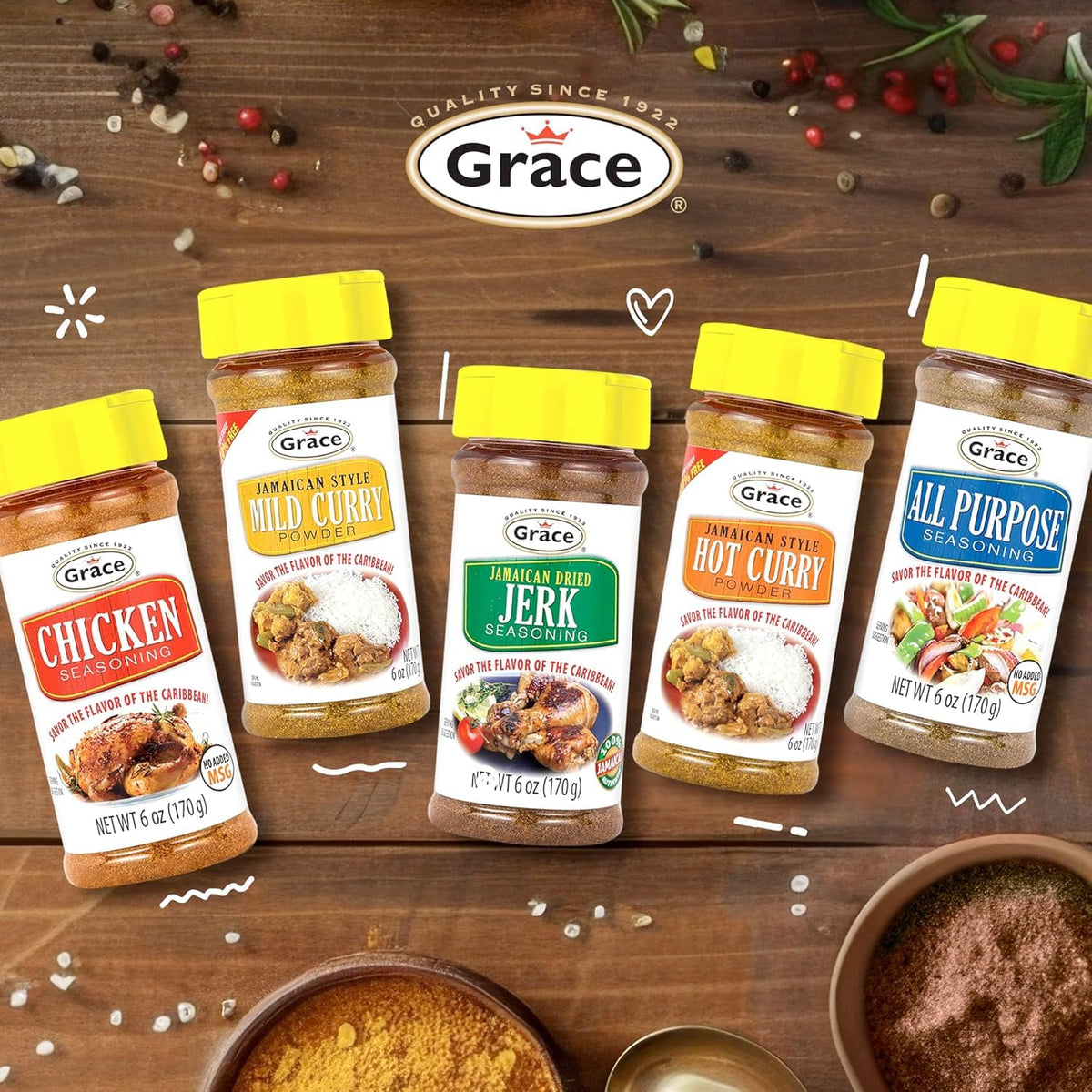 Grace Jamaican Dry Jerk Seasoning jar on grill—smoky, fragrant spice blend for steaks.