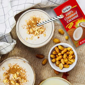 Grace Pure Creamed Coconut close-up label shows no gums or preservatives for clean ingredients.