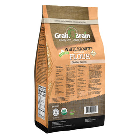 Grain Brain White Kamut Flour in measuring cup for precise prep.