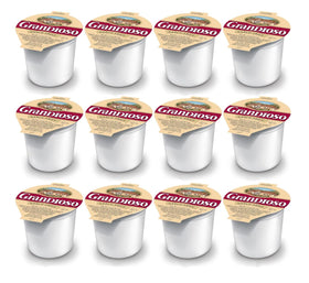 Grandioso garlic dipping sauce cup beside pizza slices for easy dipping