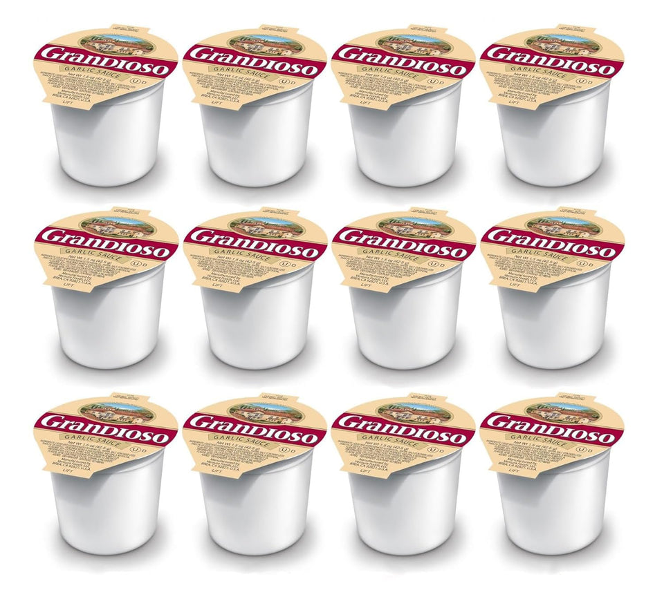 Grandioso garlic dipping sauce cup beside pizza slices for easy dipping