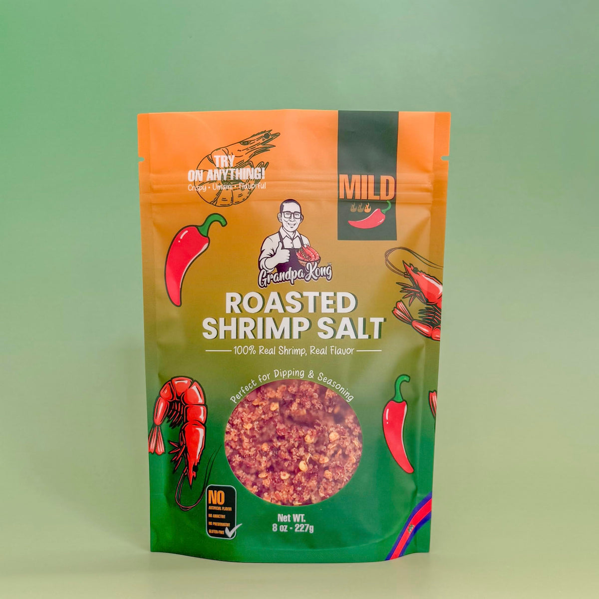 Grandpa Kong Roasted Shrimp Salt Mild on popcorn and nuts for savory crunch.