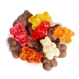 Grandys Candys close-up of milk chocolate coating on gummi bears highlights creamy texture and shine.