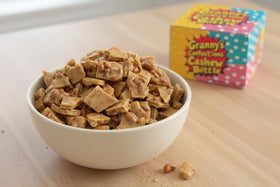 Close-up of Granny's Confections cashew brittle with whole cashews