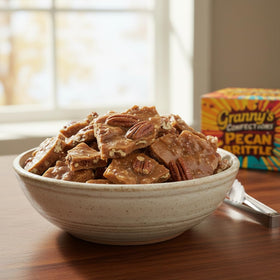 Granny's Confections Pecan Brittle ingredients closeup highlighting real pecans and vanilla.