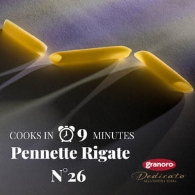 Granoro Dedicato Penne Rigate cooked to al dente perfection in a dish.