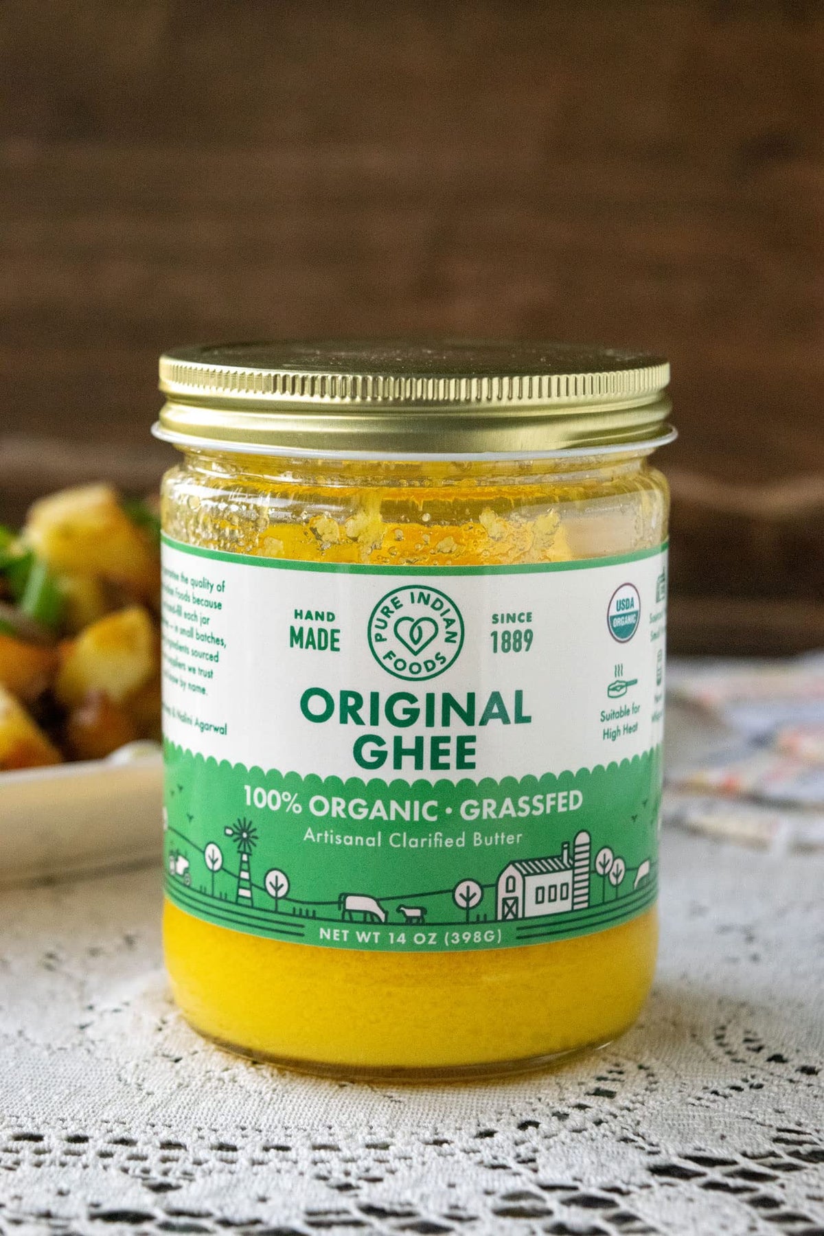 Serving ghee with roasted vegetables to enrich flavor