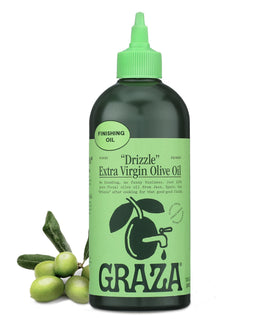 Graza Drizzle bottle pouring over salad to finish with bold flavor.