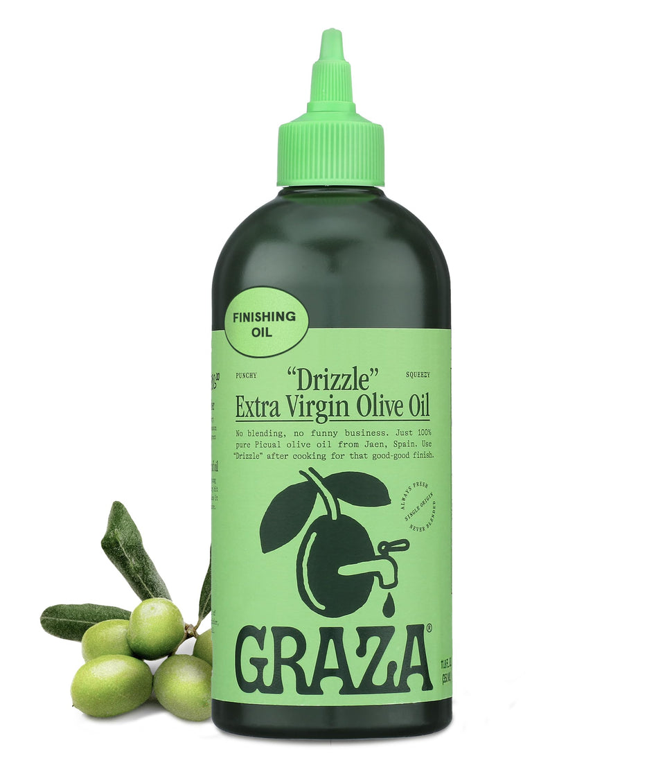 Graza Drizzle bottle pouring over salad to finish with bold flavor.