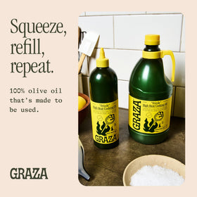 Graza Frizzle 2L jug label focuses on olive-oil purity for everyday use.