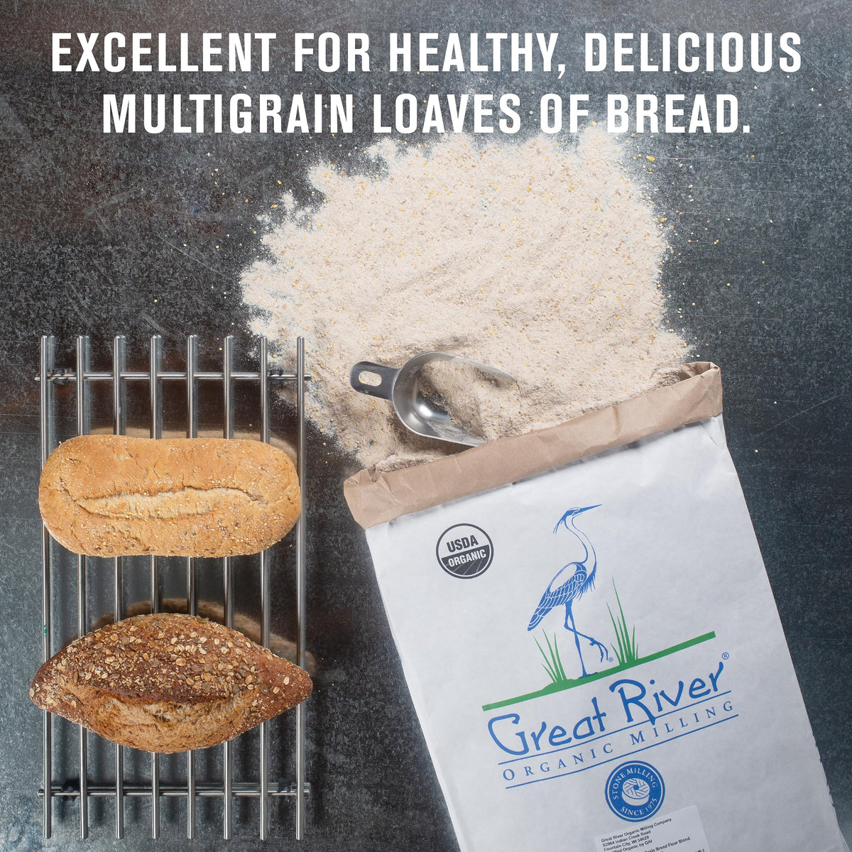 Great River Organic Seven Grain flour in a rustic baking setup for hearty loaves and muffins.