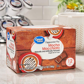 Great Value cappuccino pods showing creamy foam topping for café-style drinks.