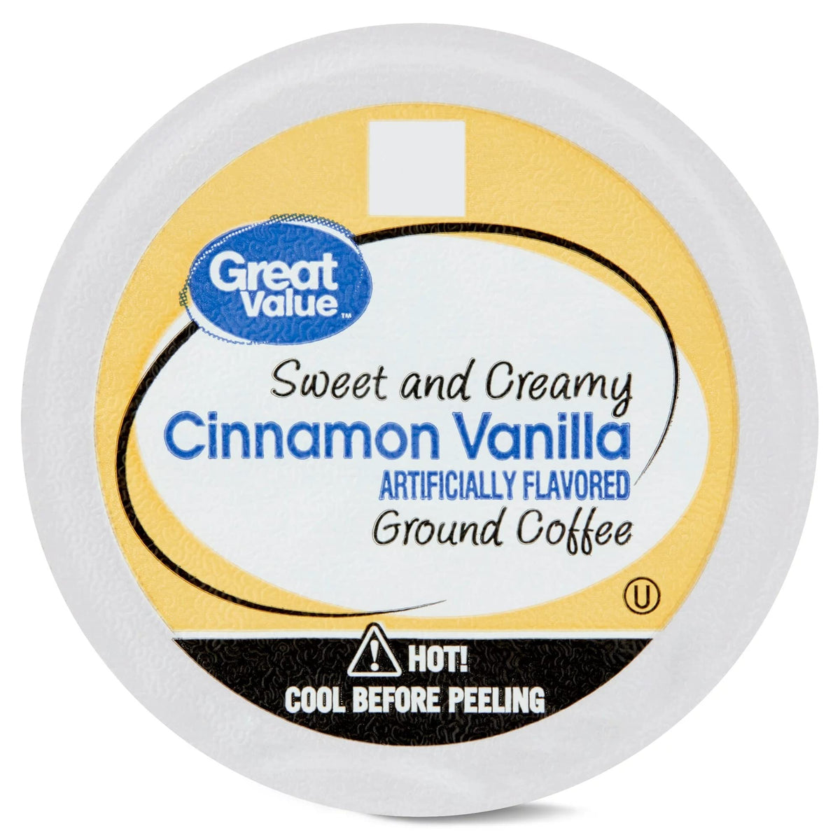GV cinnamon vanilla coffee pod in a steaming cup setup.