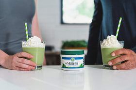 Green Foods matcha bowl being whisked into a smooth froth.