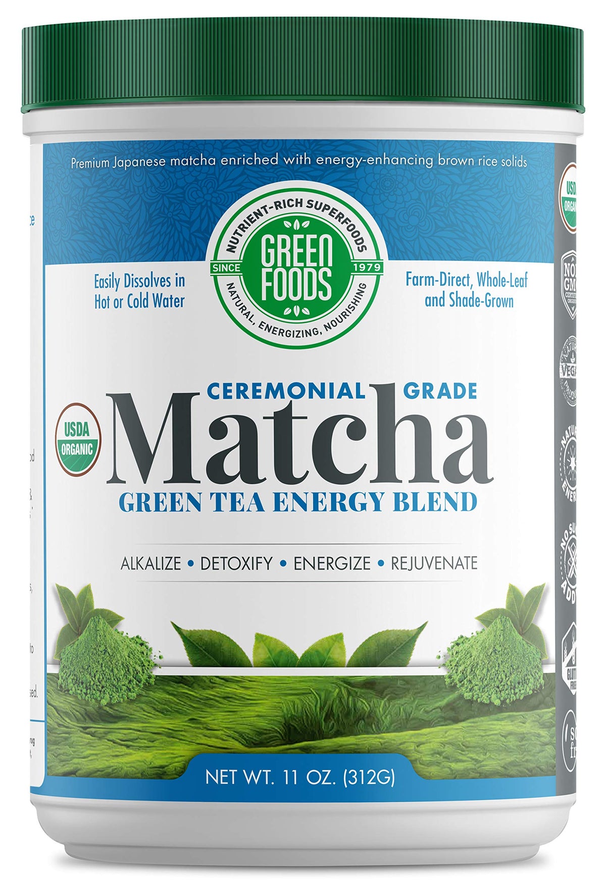 Green Foods ceremonial-grade matcha tin opened with vibrant powder for whisking rituals