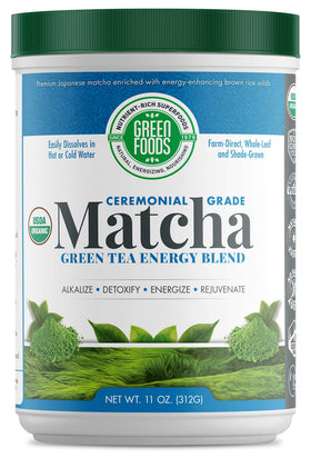 Green Foods ceremonial-grade matcha tin opened with vibrant powder for whisking rituals