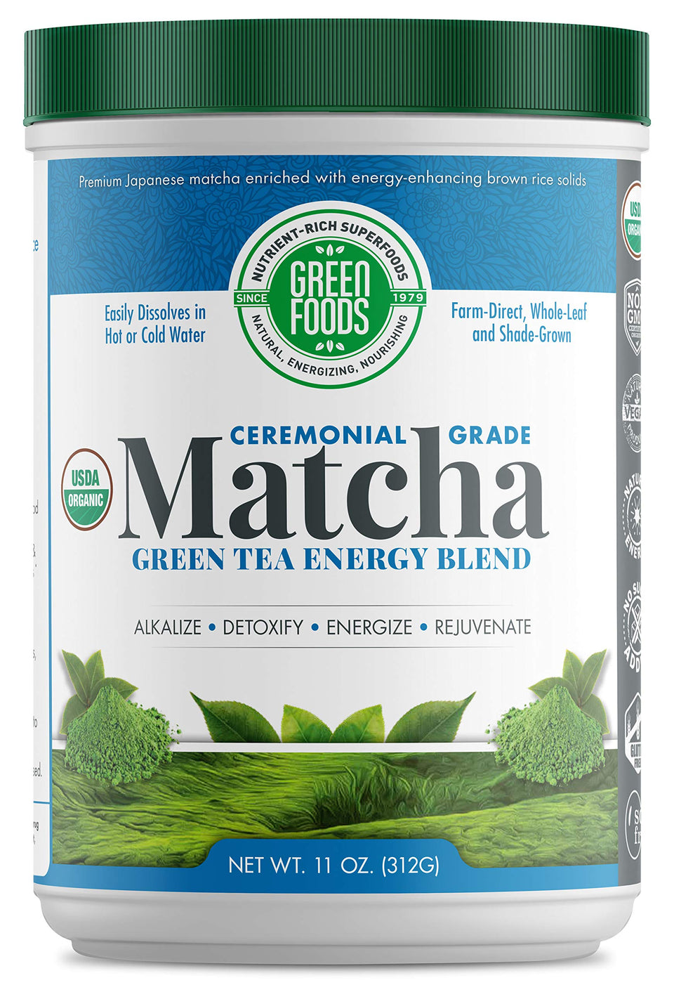Green Foods ceremonial-grade matcha tin opened with vibrant powder for whisking rituals