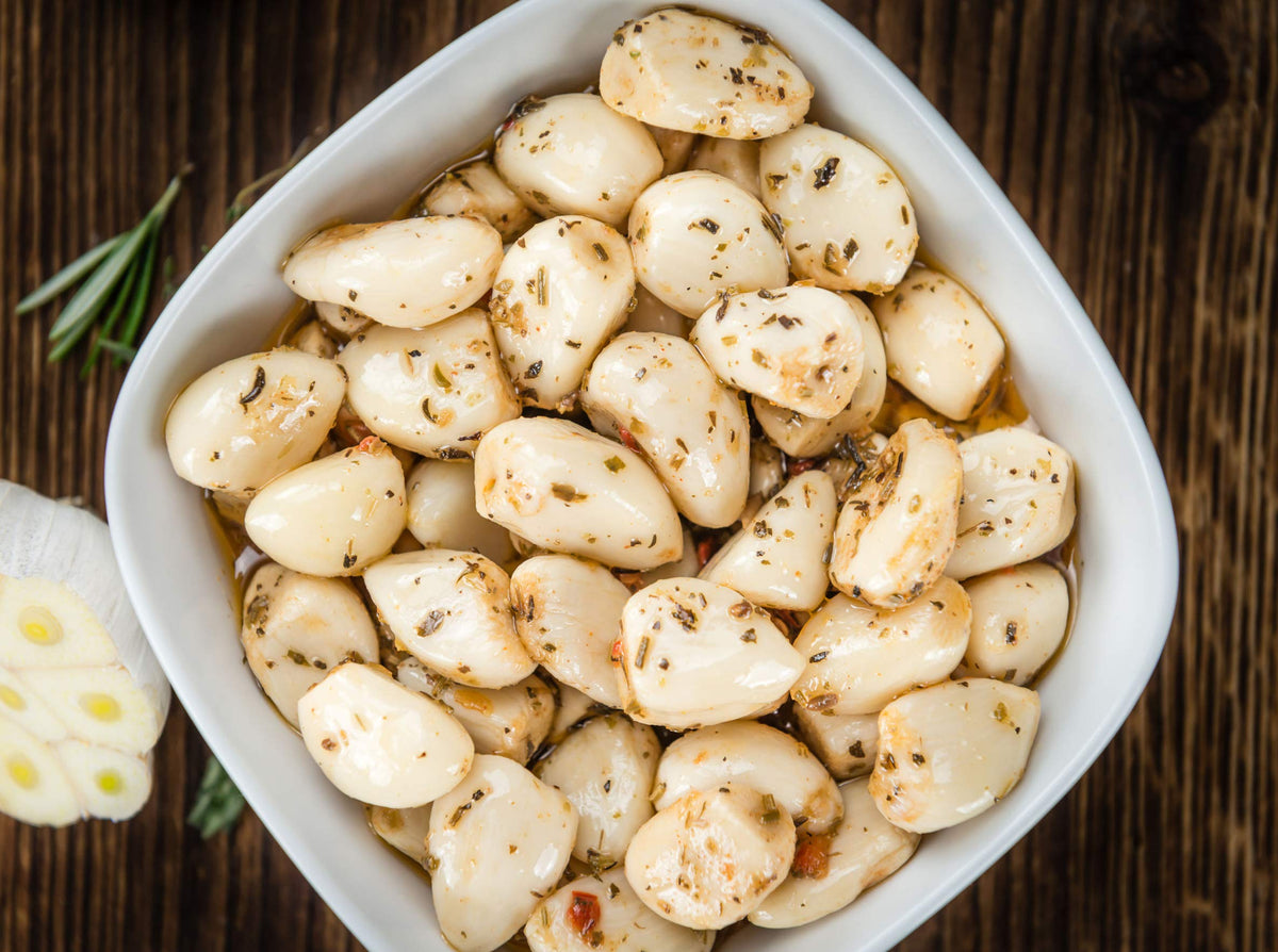 Green Jay Gourmet garlic brine infusion in a jar for dressings and pizzas