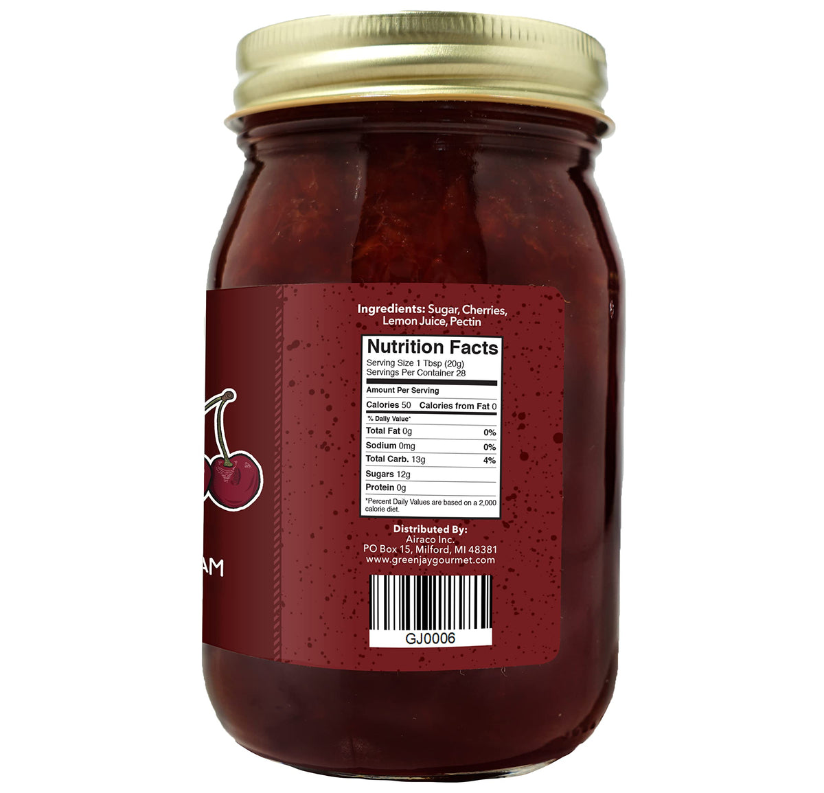 Green Jay Gourmet Cherry Jam jar on counter ready to spread on toast.